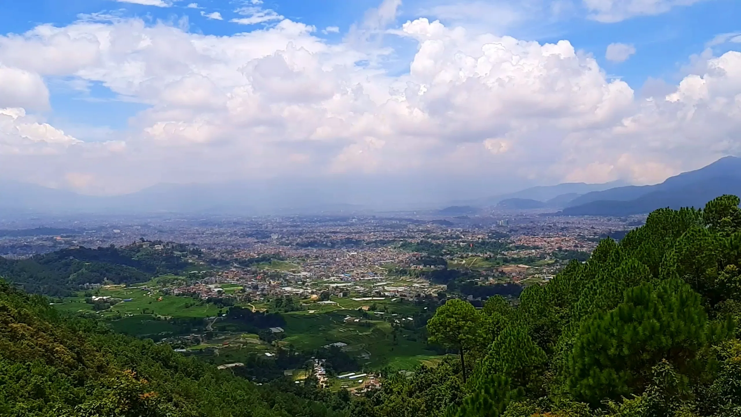As we marched beyond Kapan toward the hills near Gokarna, the valley appeared even grander beneath a sunny, cloud-dotted sky.

The conversations grew louder, the jokes became funnier, and strangers on the trail somehow became part of our adventure for the day.